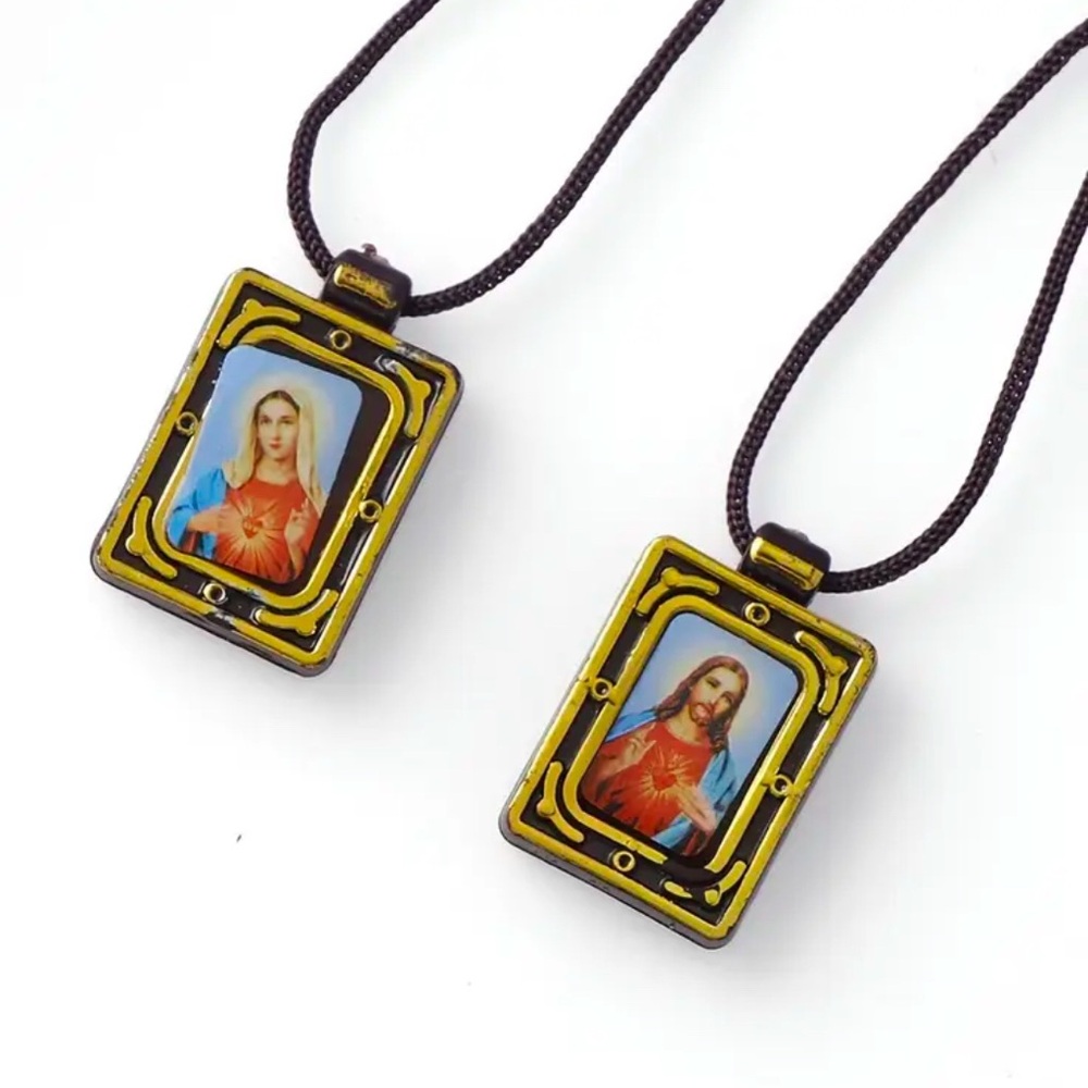 Gold and Black Pendant Necklace with Rectangular Design and Spiritual Imagery
